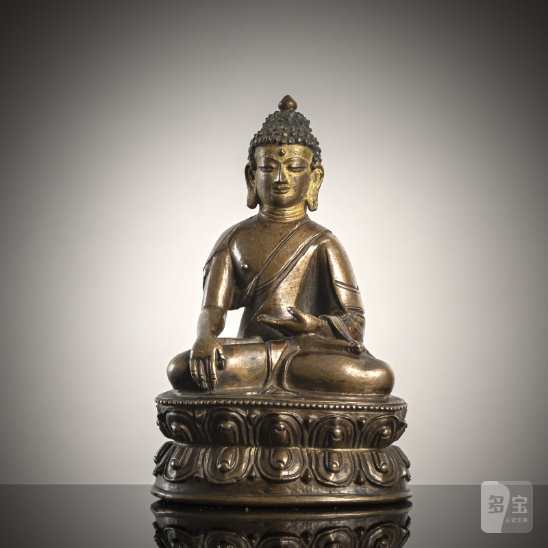 A BRONZE FIGURE OF BUDDHA SHAKYAMUNI